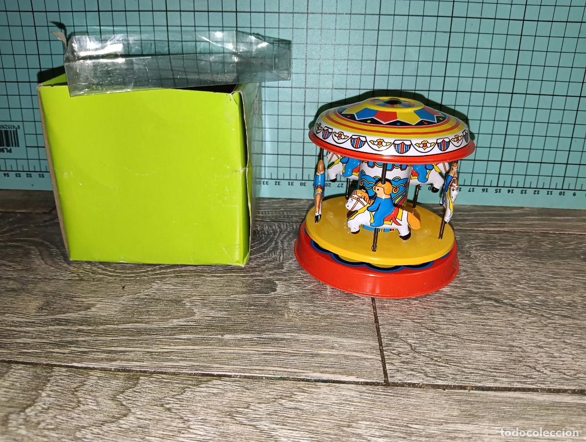 Juguetes antiguos de hojalata: Reproduccion juguete de hojalata Tin toys Tiovivo Carrusel accionado por palanca
