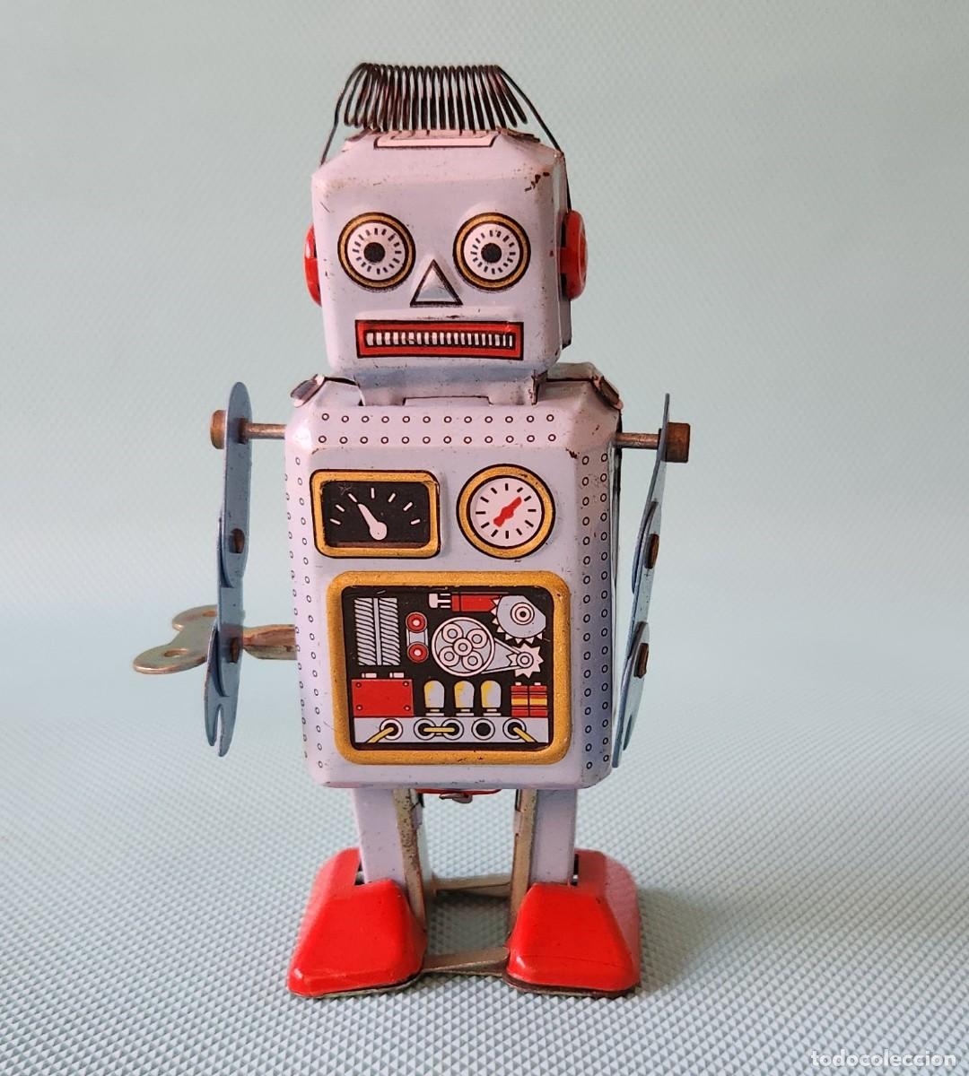 Juguetes antiguos de hojalata: ROBOT ESPACIAL DE HOJALATA - r&eacute;plica a cuerda CHINA