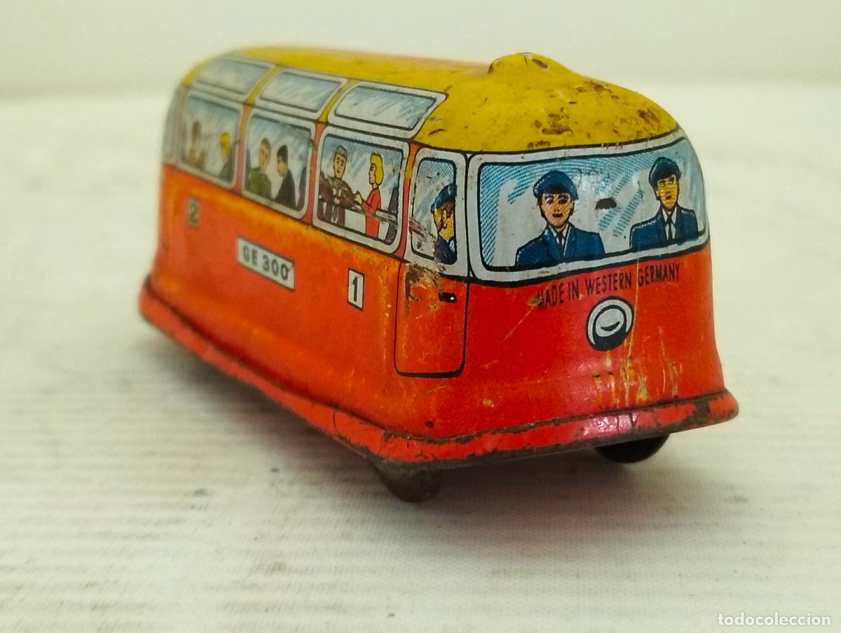 Juguetes antiguos de hojalata: ANTIGUO AUTOBUS DE HOJALATA A CUERDA, MEDIDAS 8 X 3 X 3 CM, MADE IN WESTER GERMANY, FUNCIONA