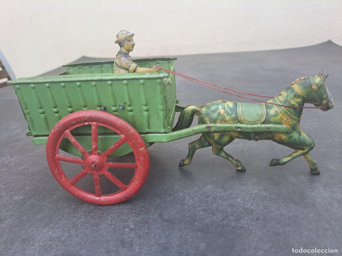 Tin Toys: Precioso y muy antiguo CARRUAJE con PERSONAJE de hojalata (lata) litografiada