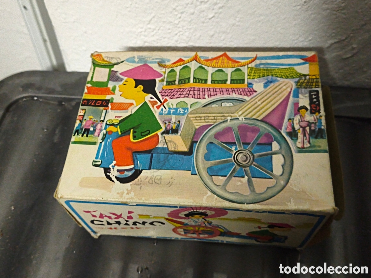 Juguetes antiguos de hojalata: Taxi chino de la marca Comando - Foto 7