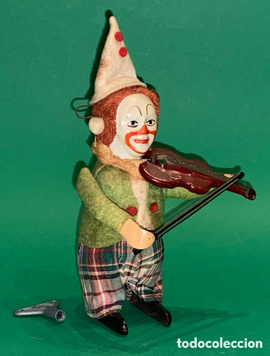 Juguetes antiguos de hojalata: SCHUCO - Payaso violinista, a&ntilde;os 40 (Made in Germany)