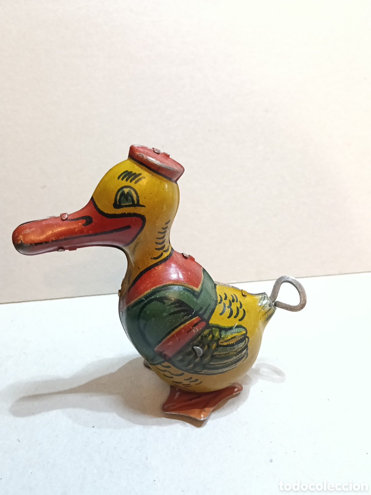 Brinquedos antigos de folha-de-Flandres: Pato de Rico a cuerda
