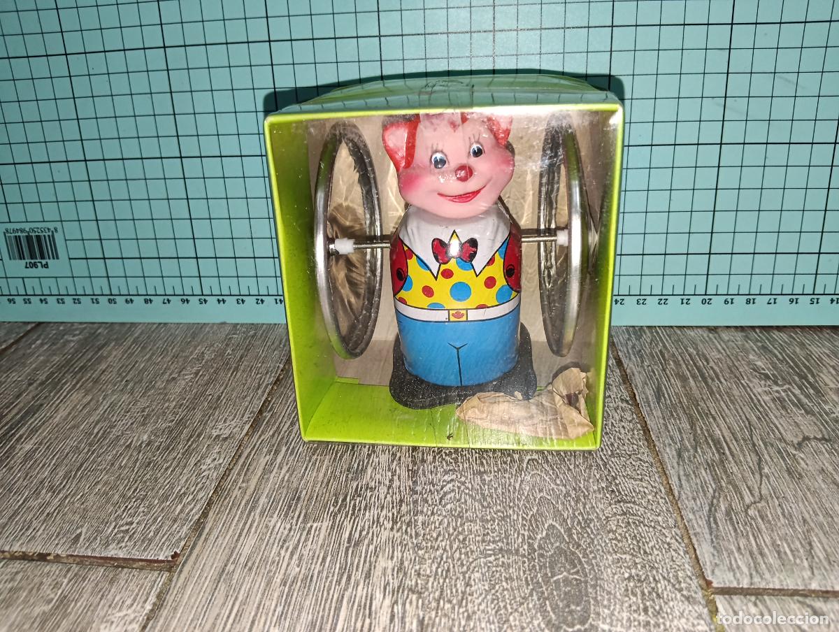 Juguetes antiguos de hojalata: Reproduccion juguete de hojalata Tin toys Oso Payaso con ruedas giratorias a cuerda