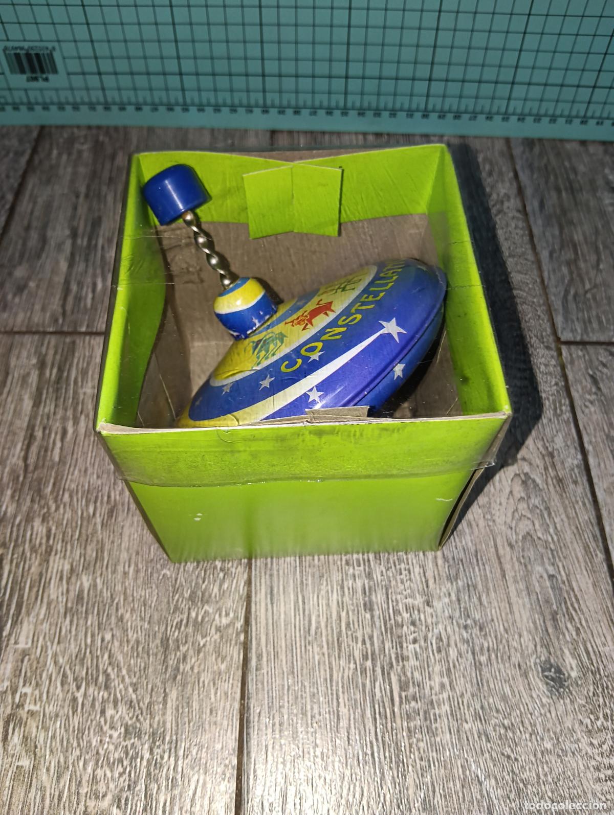 Juguetes antiguos de hojalata: Reproduccion juguete de hojalata Tin toys peonza constelaciones