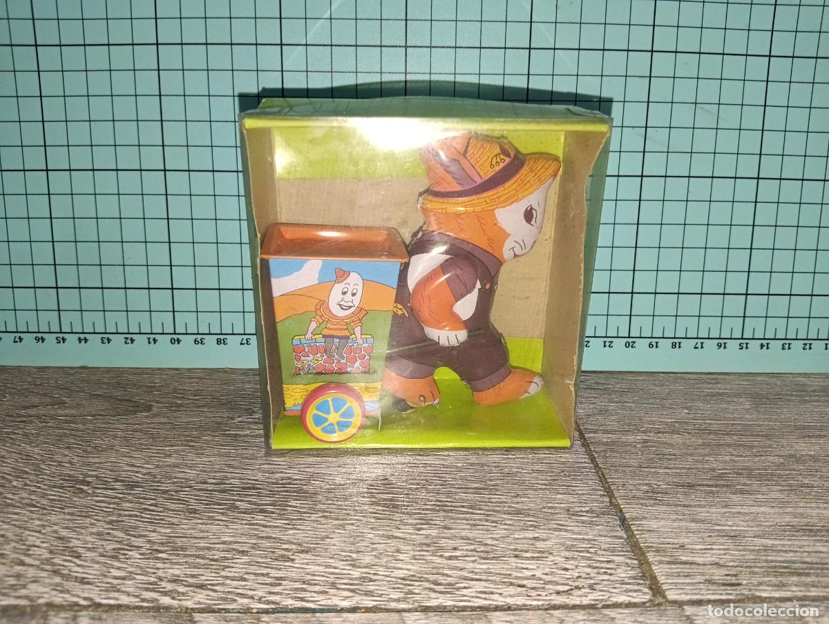 Juguetes antiguos de hojalata: Reproduccion juguete de hojalata Gato / Conejo con carreta Humpty Dumpty Tin toys a cuerda