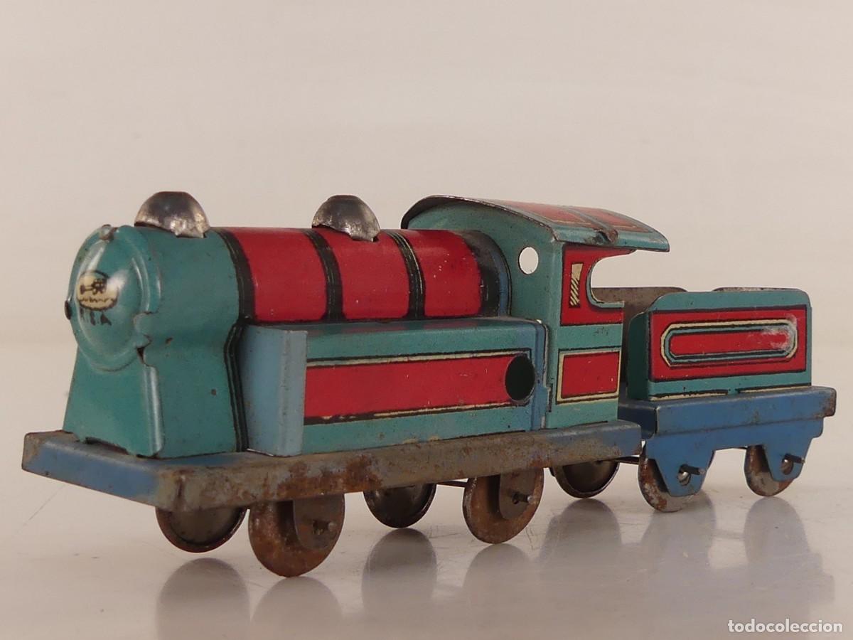 Juguetes antiguos de hojalata: ANTIGUO JUGUETE DE HOJALATA LOCOMOTORA CON TENDER R.S.A.