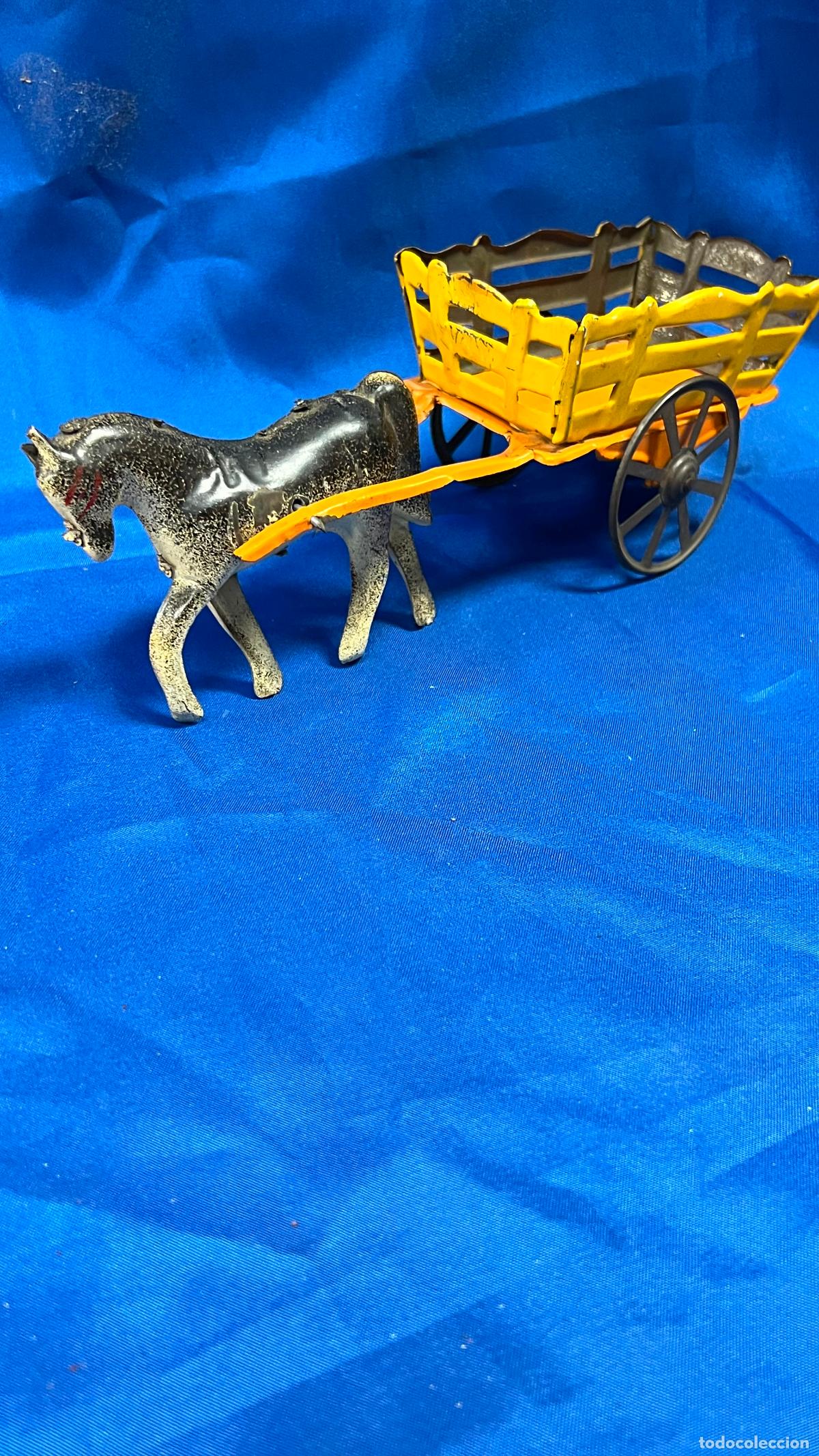 Juguetes antiguos de hojalata: carro de hojalata con burro o caballo original de epoca