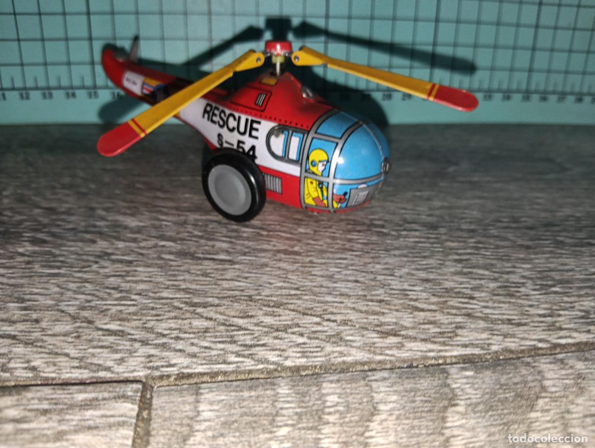 Juguetes antiguos de hojalata: Reproducci&oacute;n Juguete de hojalata Tin Toys Helic&oacute;ptero de rescate