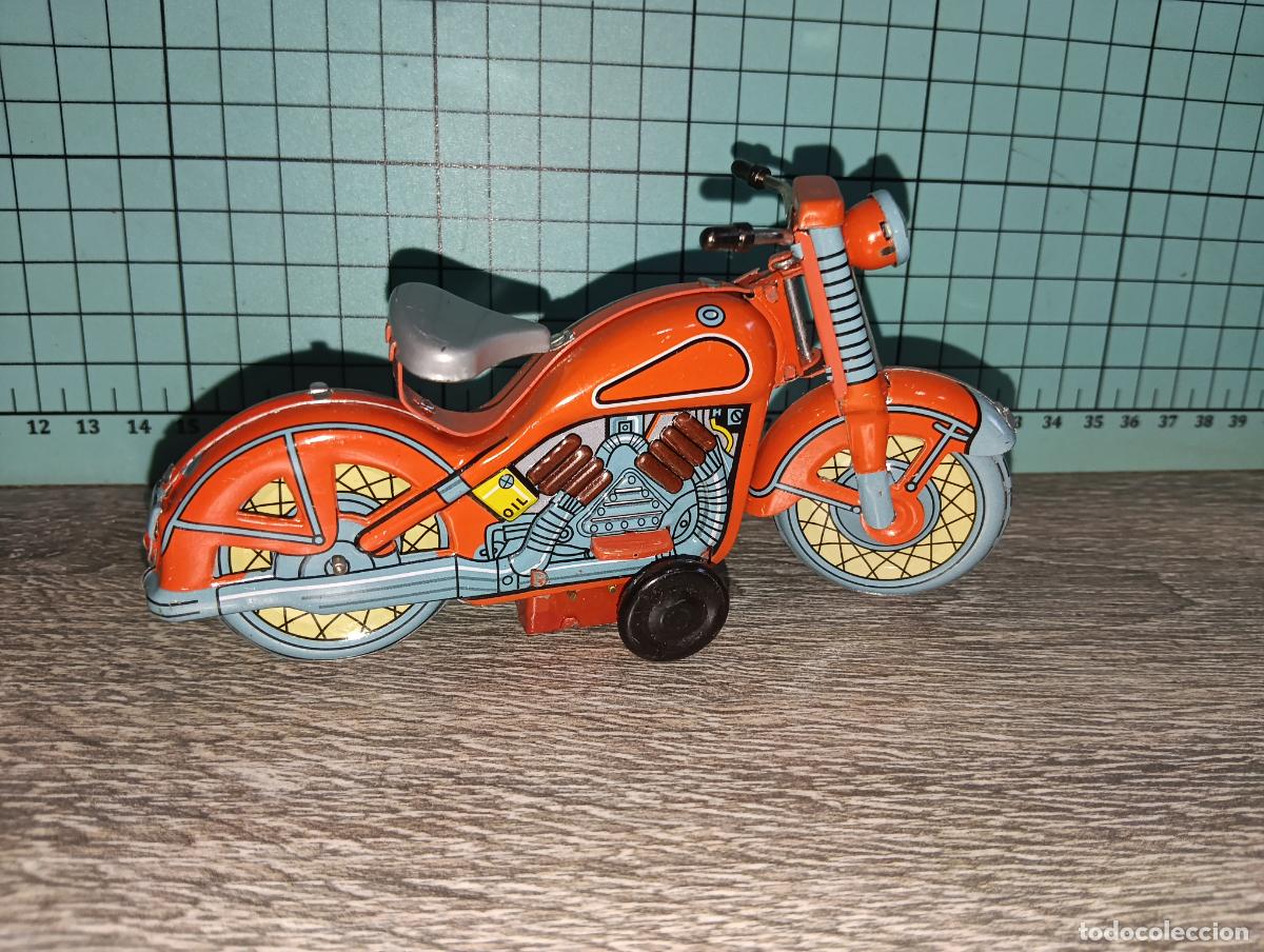 Juguetes antiguos de hojalata: Reproducci&oacute;n Juguete de hojalata Tin Toys Moto a cuerda