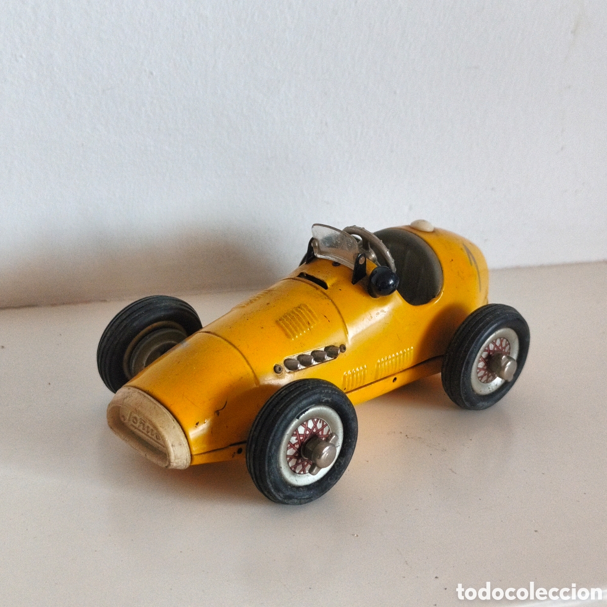 Juguetes antiguos de hojalata: Coche b&oacute;lido metal Schuco Grand Prix Racer 1070 amarillo, a cuerdo, Alemania Ocupada US-zone 1949