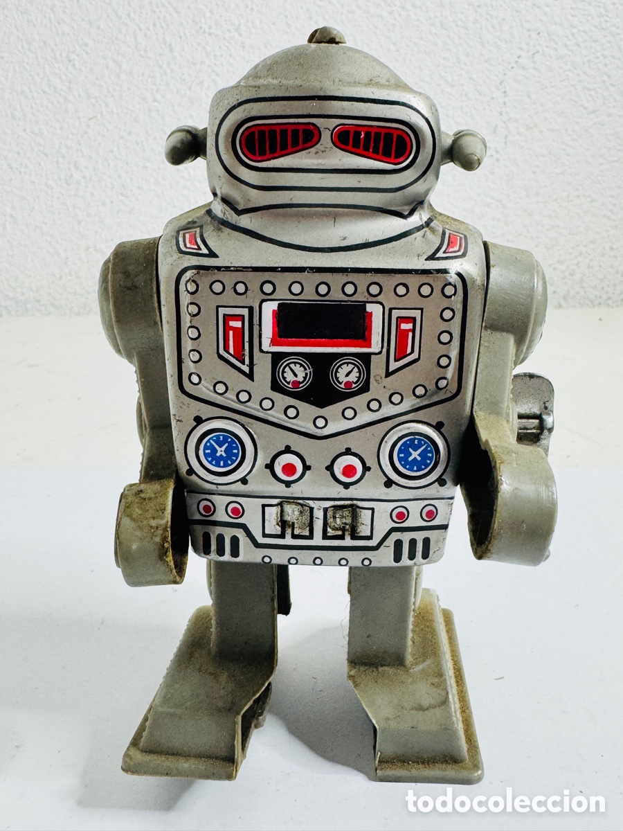 Juguetes antiguos de hojalata: Captain Robot vintage de cuerda fabricado por MTU Korea 1970s