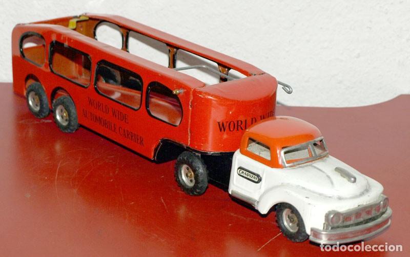 Juguetes antiguos de hojalata: Cami&oacute;n World Wide Automobile Carrier -