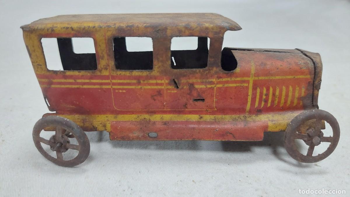 Juguetes antiguos de hojalata: Antiguo coche hojalata