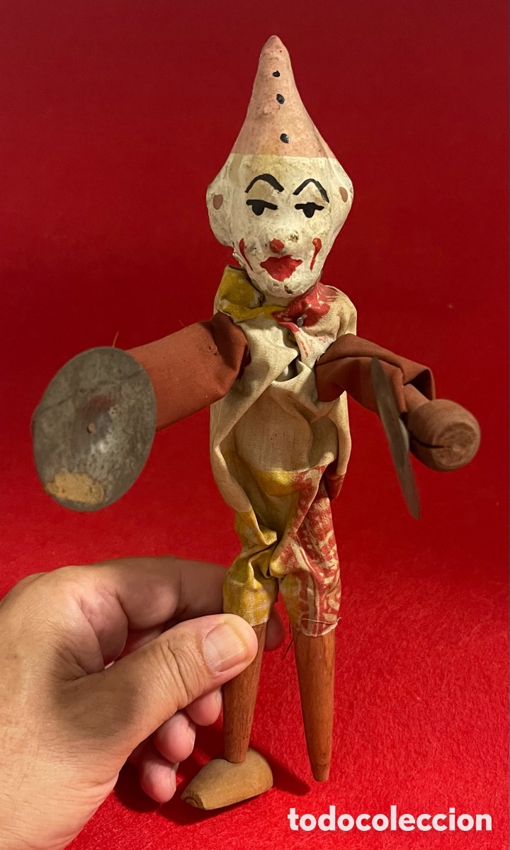Juguetes antiguos de hojalata: Juguete antiguo de payaso, tocando los platillos. Funcionamiento a presi&oacute;n.