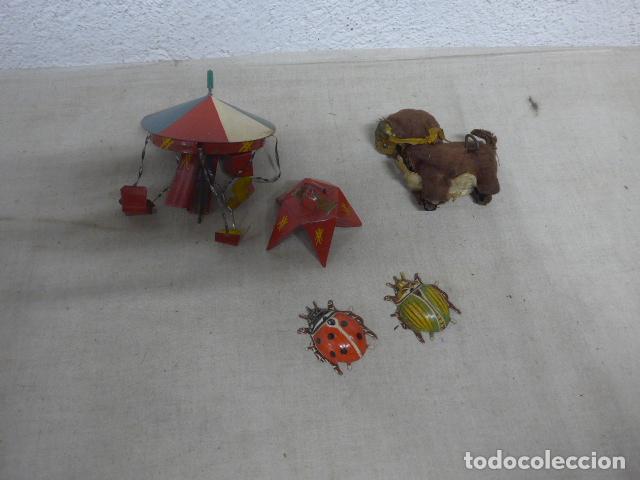 Juguetes antiguos de hojalata: Lote de 4 antiguos juguetes de hojalata a identificar y restaurar.