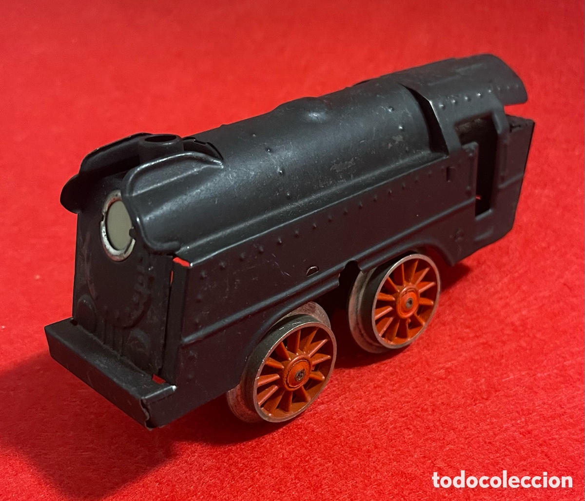 Tin Toys: Antigua locomotora a cuerda, en hojalata.