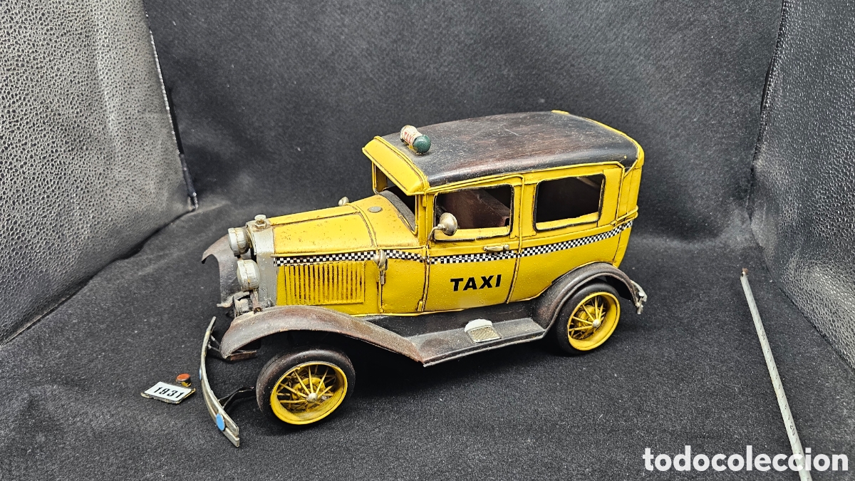 Juguetes antiguos de hojalata: Taxi de hojalata......