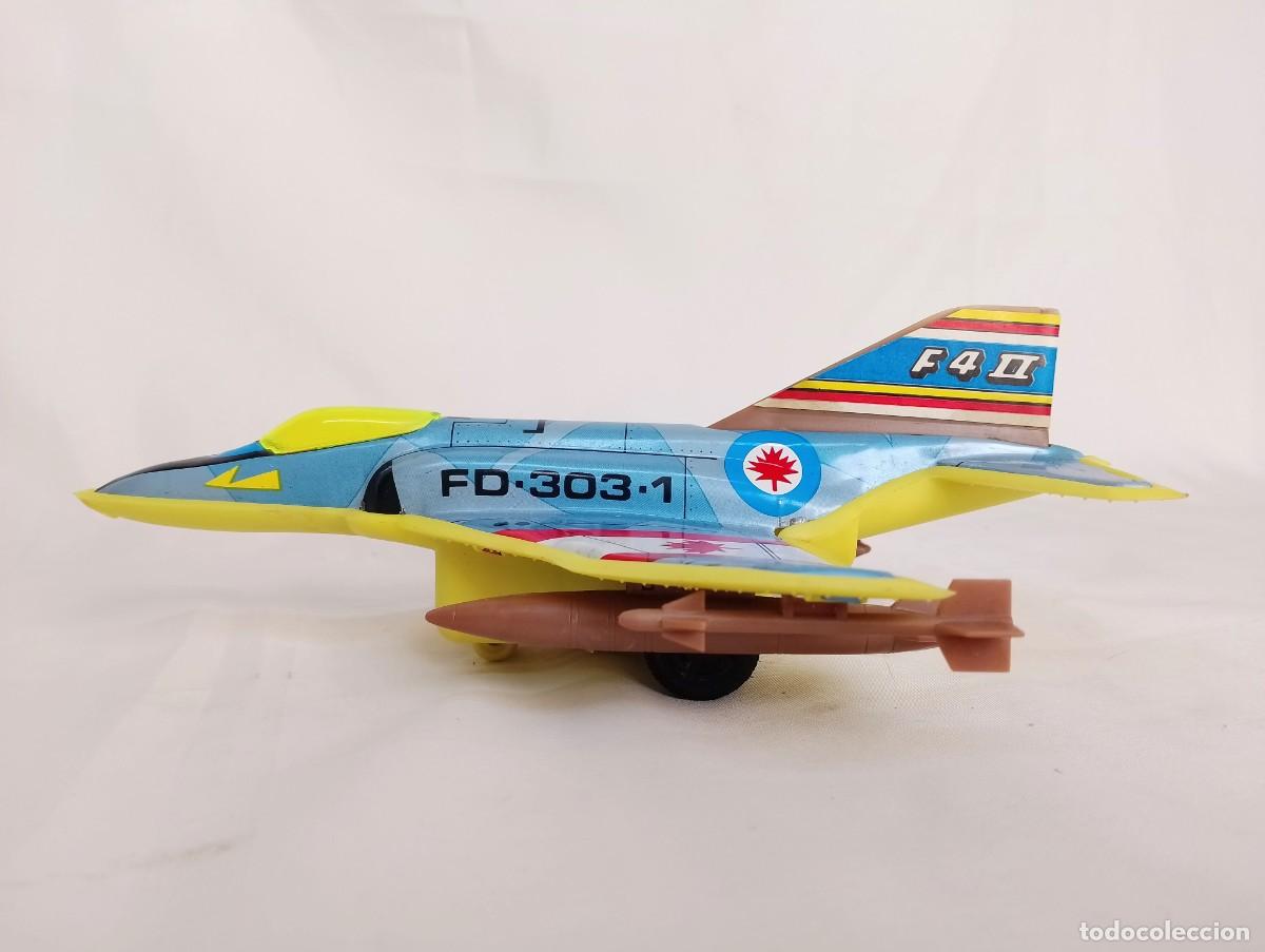Antikes Blechspielzeug: RESORTES VALLS ref.23 FHANTOM F-4 CANAD&Aacute;. AVION RETROFRICCI&Oacute;N EN CHAPA Y PL&Aacute;STICO