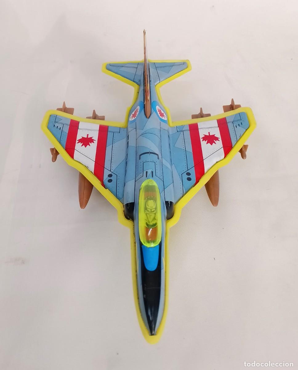 Antikes Blechspielzeug: RESORTES VALLS ref.23 FHANTOM F-4 CANAD&Aacute;. AVION RETROFRICCI&Oacute;N EN CHAPA Y PL&Aacute;STICO