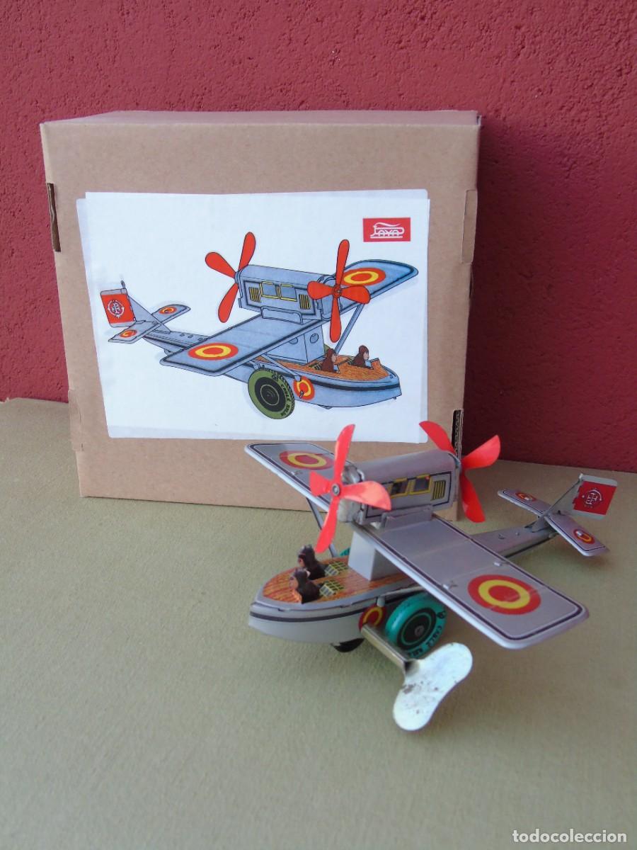 Juguetes antiguos de hojalata: AVI&Oacute;N DE HOJALATA DE CUERDA, CON LLAVE Y SU CAJA. MARCA JAYA. FUNCIONANDO