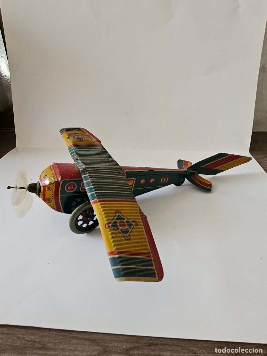 Brinquedos antigos de folha-de-Flandres: Avi&oacute;n de hojalata de Pay&aacute; azul, ref. 606, a&ntilde;os 40