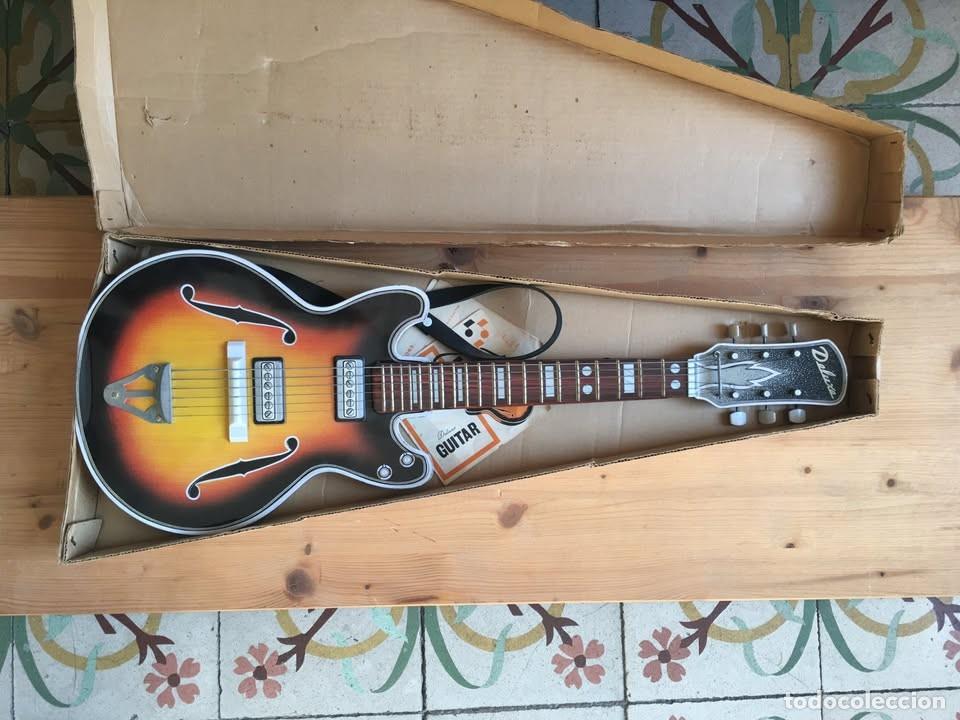 Juguetes antiguos de hojalata: Nomura Guitarra Tinplate Hojalata - caja y folleto original 1960/70's