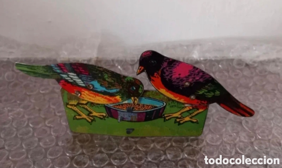 Brinquedos antigos de folha-de-Flandres: Pajaros de hojalata de Pico
