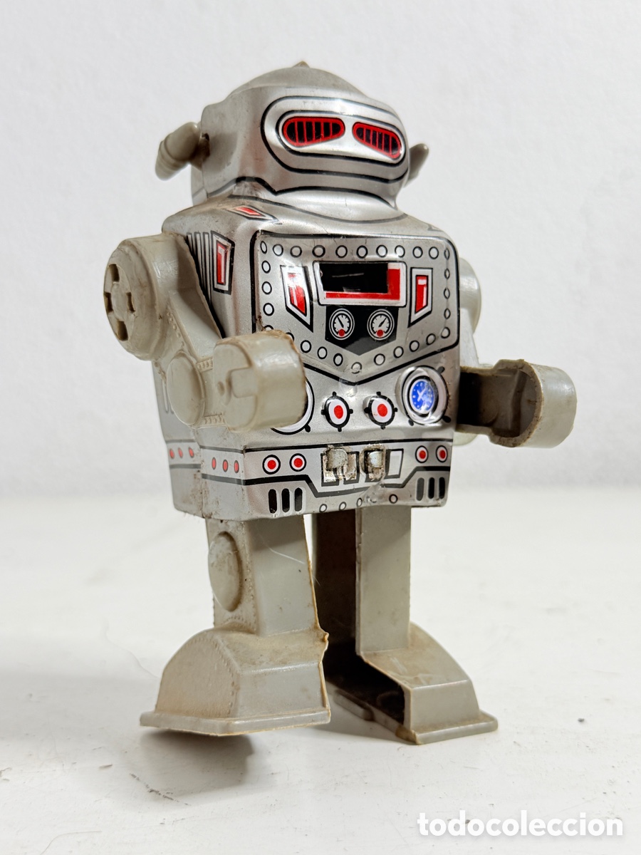 Juguetes antiguos de hojalata: Captain Robot vintage de cuerda fabricado por MTU Korea 1970s