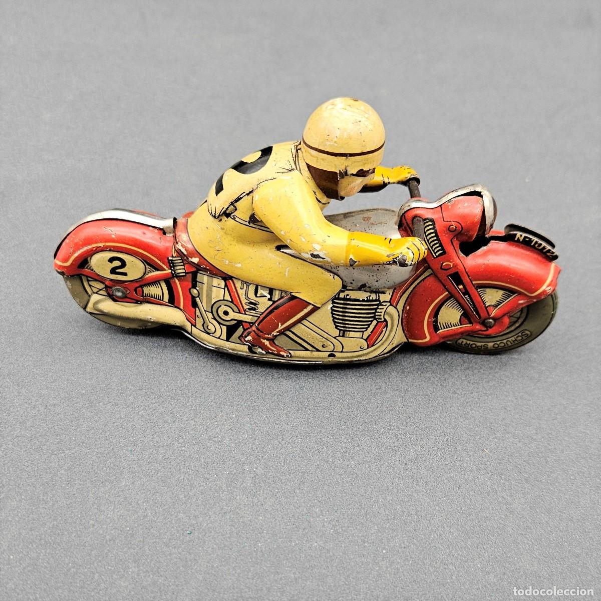 Juguetes antiguos de hojalata: Juguete de hojalata motociclista de Schuco. 1937 - 1945