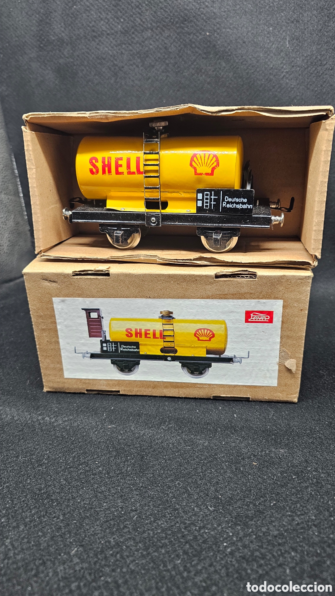 Jouets anciens en fer-blanc: reproducci&oacute;n de un vag&oacute;n cisterna de SHELL de hojalata de la marca Pay&aacute;