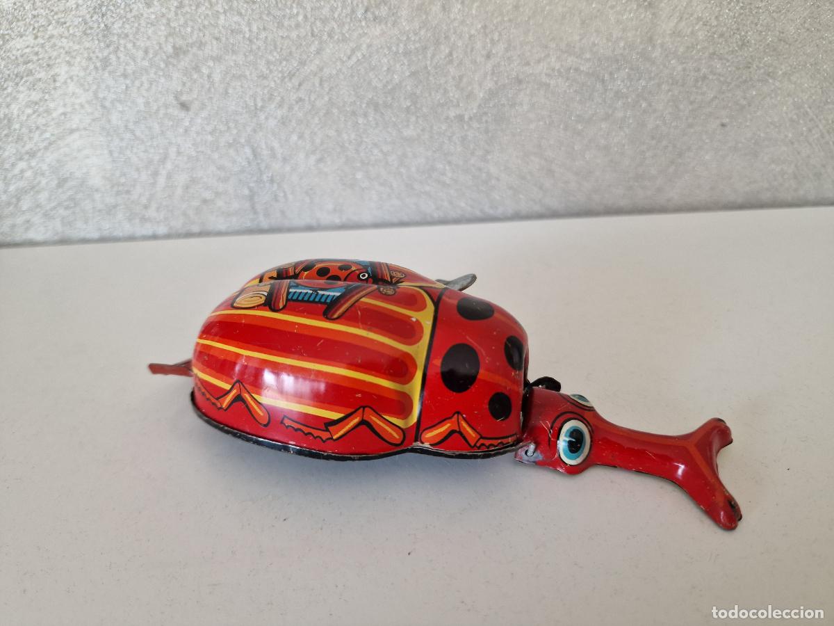 Juguetes antiguos de hojalata: ESCARABAJO DE HOJALATA A CUERDA MADE IN JAPAN