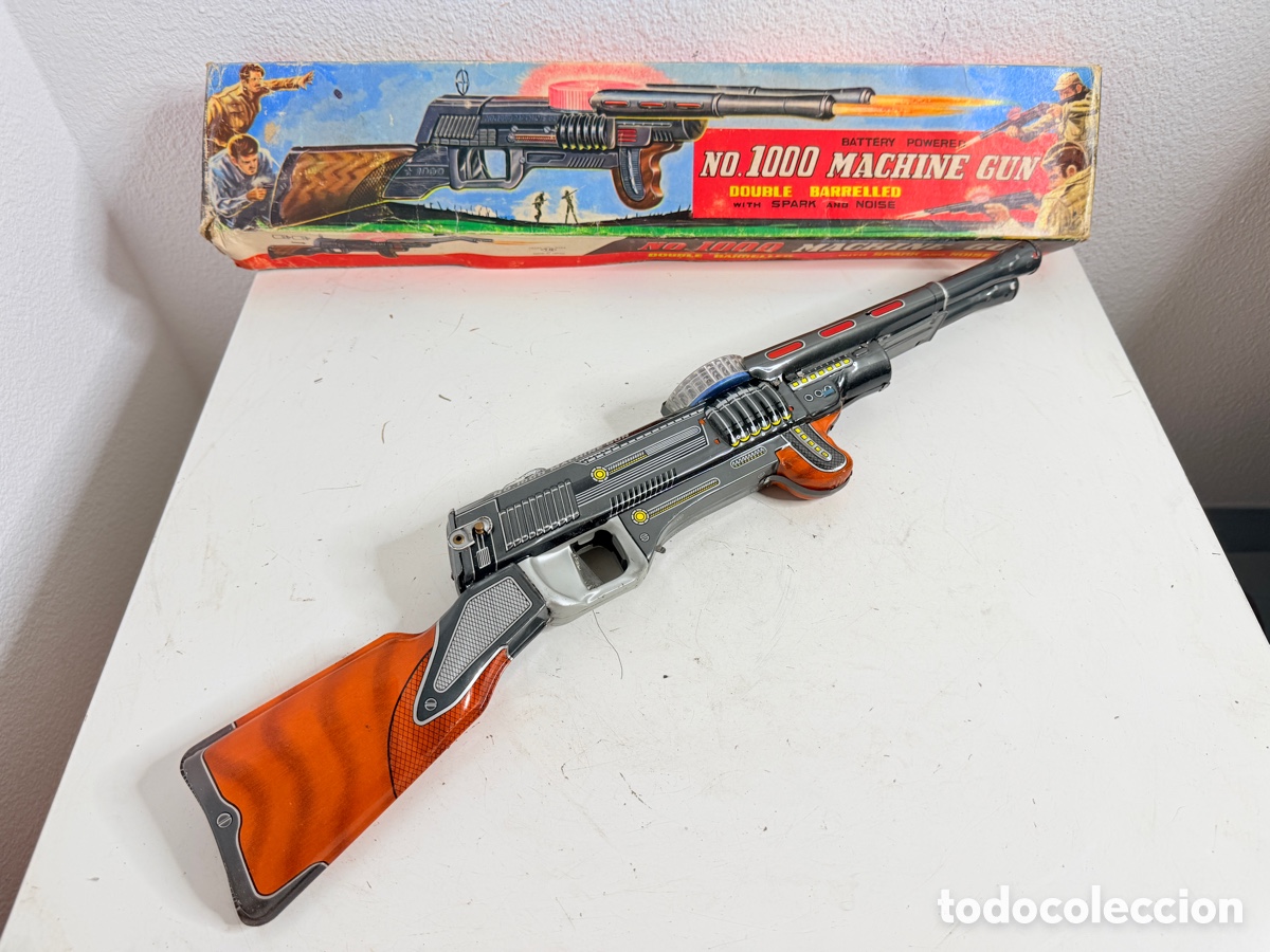 Juguetes antiguos de hojalata: No. 1000 Machine Gun, un rifle de juguete de hojalata Tin Toy Japan 1960