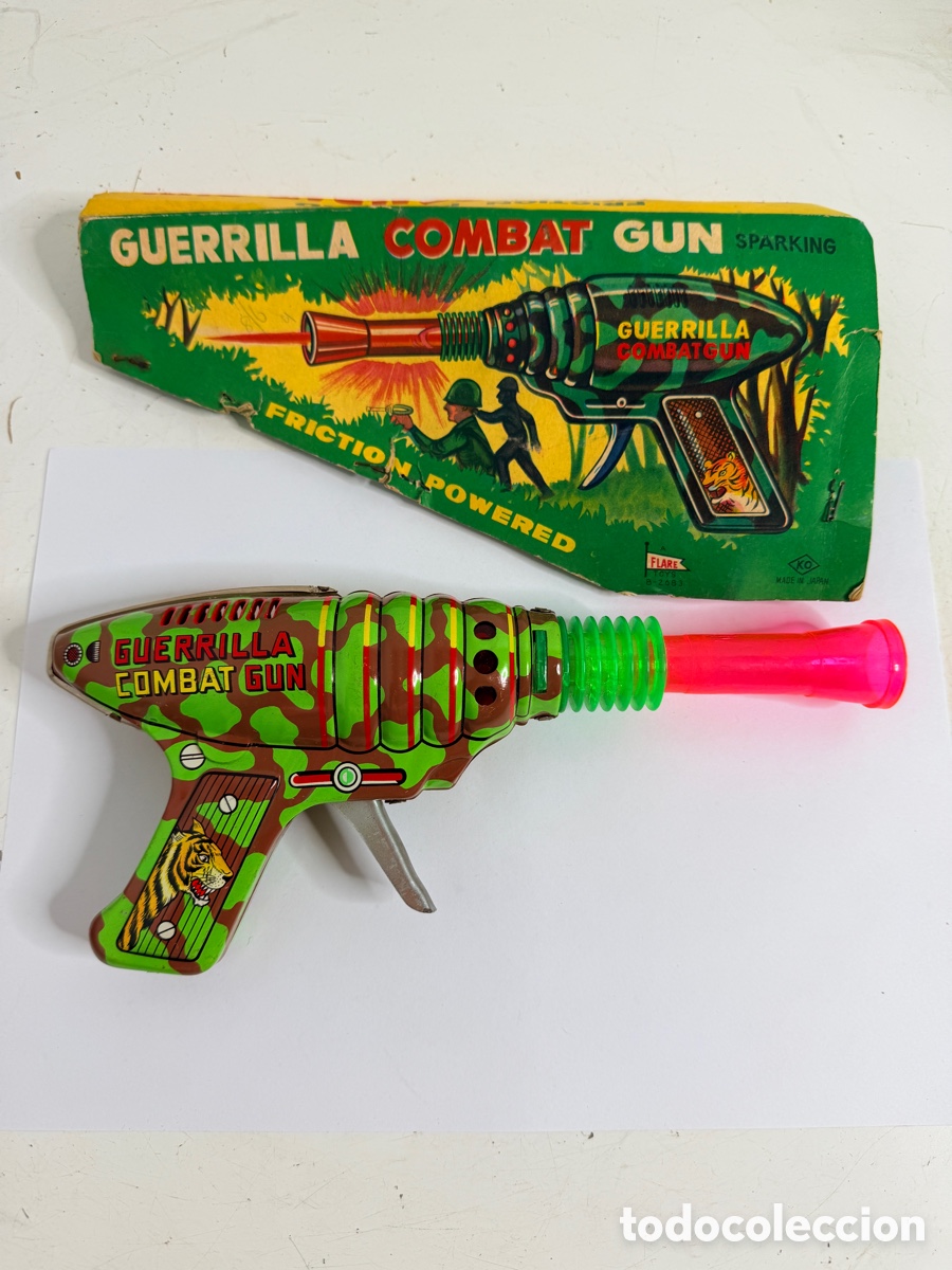 Juguetes antiguos de hojalata: KO (Knomark / Nomura) fabricada en Jap&oacute;n, modelo &rdquo;Guerrilla Combat Gun&rdquo;