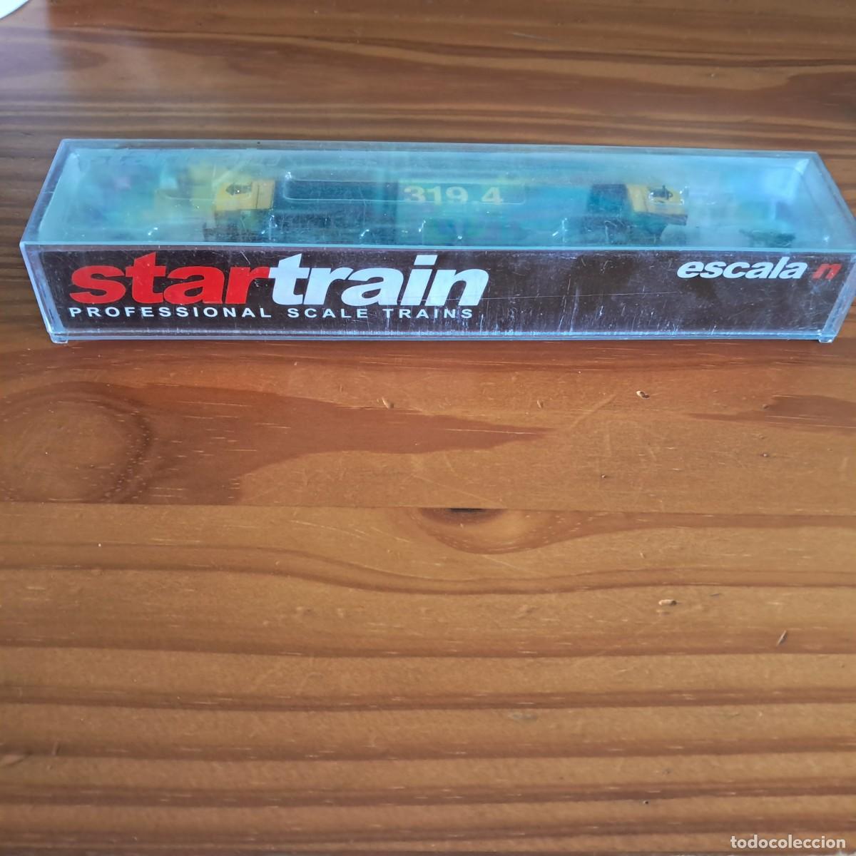 Modelos a escala: Se vende locomotora di&eacute;sel el&eacute;ctrica 19406 RENFE (319.406) en color amarillo y negro