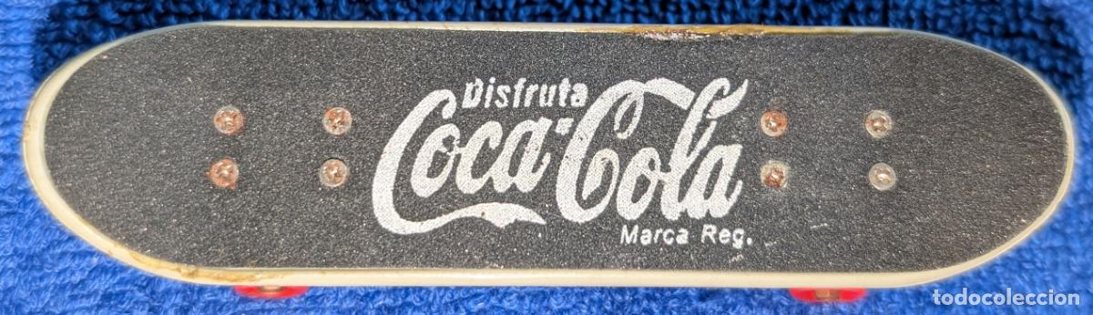 Modelli in scala: Monopat&iacute;n de dedo de Coca-Cola (2000)