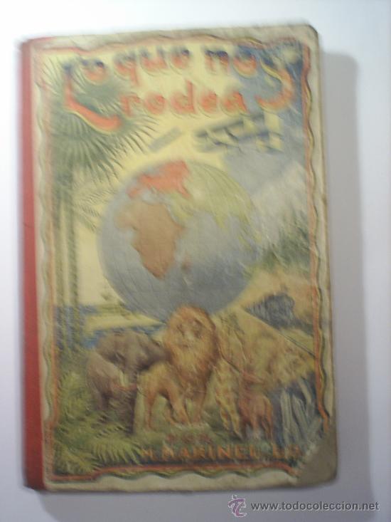 Libros antiguos: LO QUE NOS RODEA 1930 -libro escolar - Foto 1