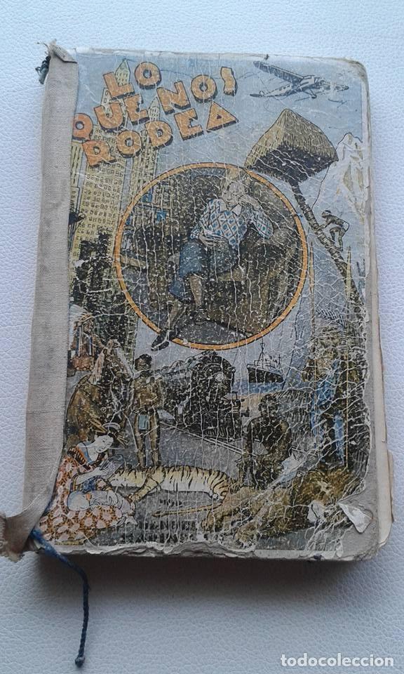 Libros antiguos: LO QUE NOS RODEA EDICI&Oacute;N DE 1912 - Foto 1