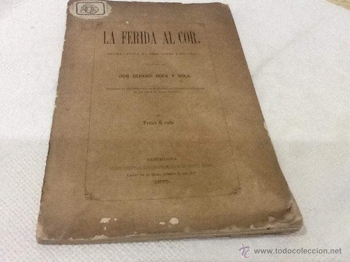 Old books: La ferida al cor, drama catal&aacute; en tres actes y en vers , 1875