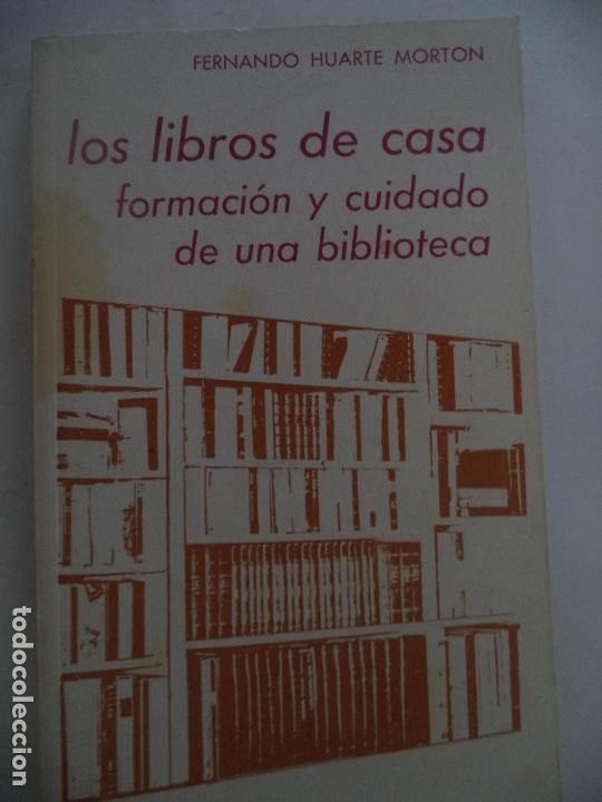 Libros antiguos: LOS LIBROS DE CASA FORMACION Y CUIDADO DE UNA BIBLIOTECA FERNANDO HUARTE - Foto 1 - 172073055