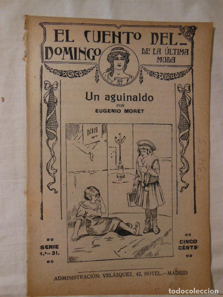 Libros antiguos: UN AGUINALDO. EUGENIO MORET. EL CUENTO DEL DOMINGO - Foto 1