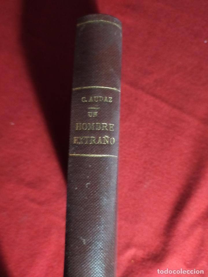 Libros antiguos: UN HOMBR EXTRA&Ntilde;O. C. AUDAZ - 1924 - Foto 1