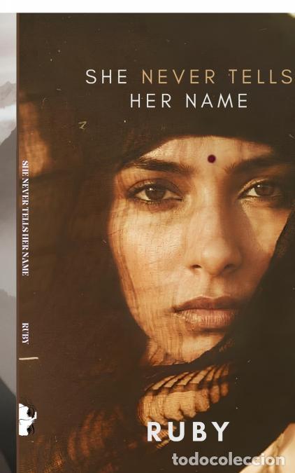 books: She Never Tells Her Name - TO THE CAGED BIRDS OUT THERE IN THE SKY - RUBY
