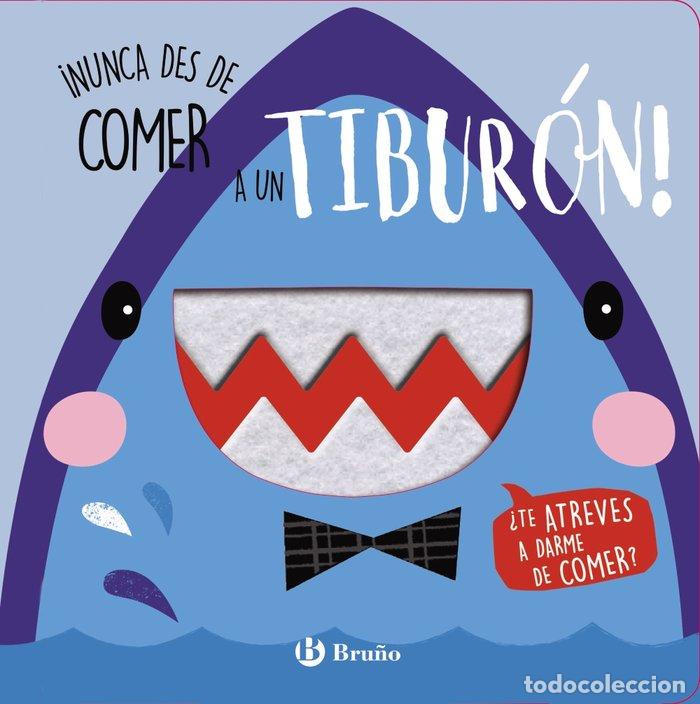 B&uuml;cher: NUNCA DES DE COMER A UN TIBURON - AA.VV.