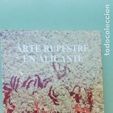 Libros de segunda mano: ARTE RUPESTRE EN ALICANTE. VV.AA. 1988 (SIN USO). Lote 371509916
