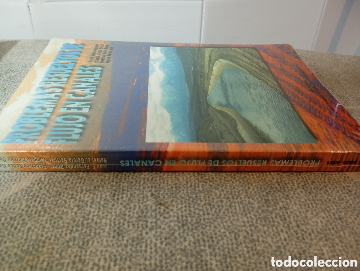 Libros de segunda mano: PROBLEMAS RESUELTOS DE FLUJO EN CANALES. - Foto 2