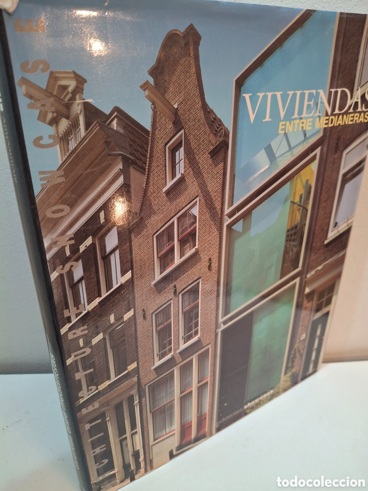 Libros de segunda mano: VIVIENDAS ENTRE MEDIANERAS-TOWN HOUSES, ARCHIETCTURE SHOWCASE, BROTO I COMERMA, 1999