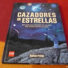 Libros de segunda mano: CAZADORES DE ESTRELLAS GUIA PARA DESCUBRIR SECRETOS FIRMAMENTO ( RAMAN PRINJA ) ASTRONOMIA NIÑOS