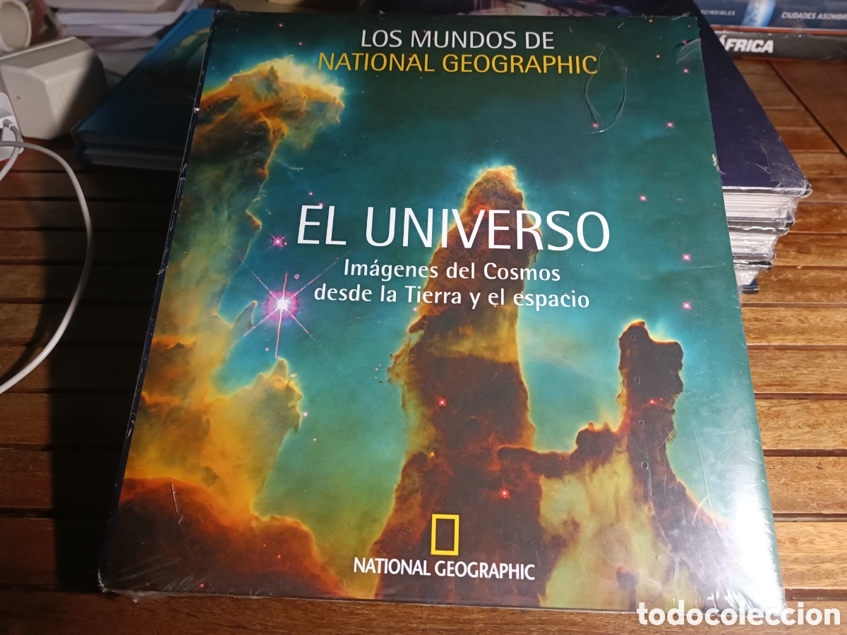 Libros de segunda mano: El universo im&aacute;genes del cosmos desde la tierra y el espacio los mundos national geographic 7
