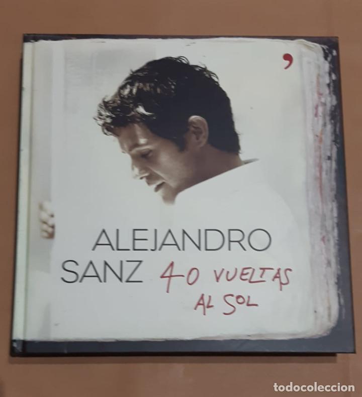 Libros de segunda mano: ALEJANDRO SANZ 40 VUELTAS AL SOL